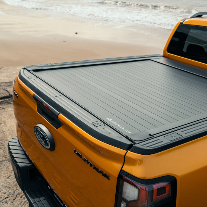 Mountain Top EVOe Electric Black Roller Tonneau Cover Ford Ranger Mk8 & Volkswagen Amarok Mk3 (2023 Onwards) Double Cab image 0